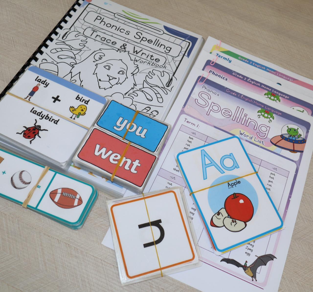 English Educational Box contents including phonics workbook, flash cards, alphabet cards, and spelling lists