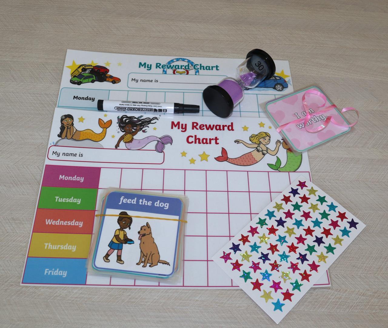 Routine Box contents including reward charts, flash cards, stickers, whiteboard marker, and hourglass timer